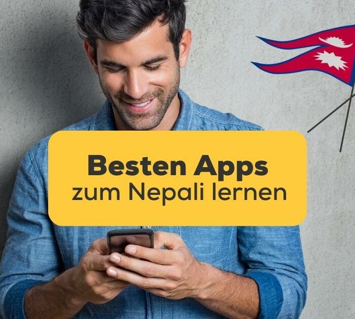 Mann schaut freudig auf sein Handy und freut sich die besten Apps zum Nepali lernen gefunden zu haben mit der Ling-App