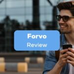 A photo of a male tourist using his phone beside the Forvo Review texts.
