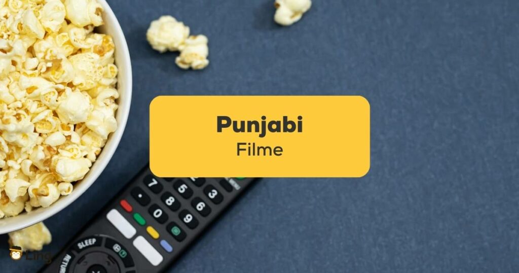 Fernbedienung mit einer Schüssel Popcorn liegt bereit um einen der 7 Punjabi Filme anzuschauen, der bei Ling empfohlen wurde