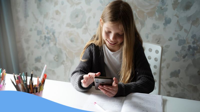 apps for vocabulary - A photo of a girl learning words using her phone