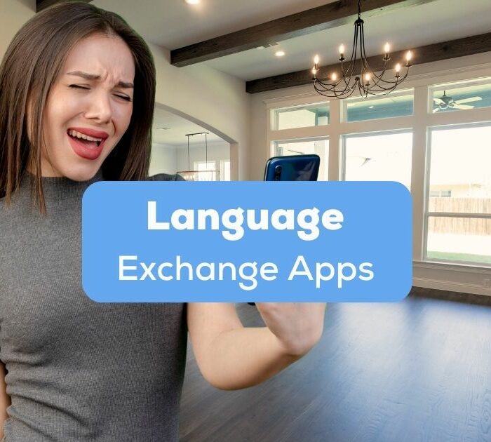 A photo of a happy female inside her house holding her phone behind the Language Exchange Apps texts.
