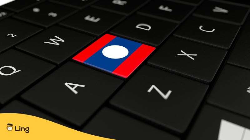 flag of Laos pasted on a black keyboard with white letters