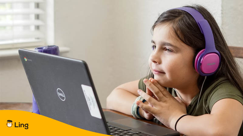 Arabic apps for kids-ling-app-girl-laptop