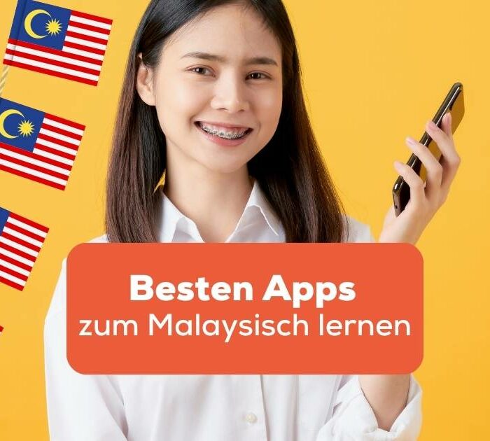 Junge asiatische Frau hält ein Smartphone in der Hand und freut sich die besten Apps zum Malaysisch lernen mit Ling-App gefunden zu haben