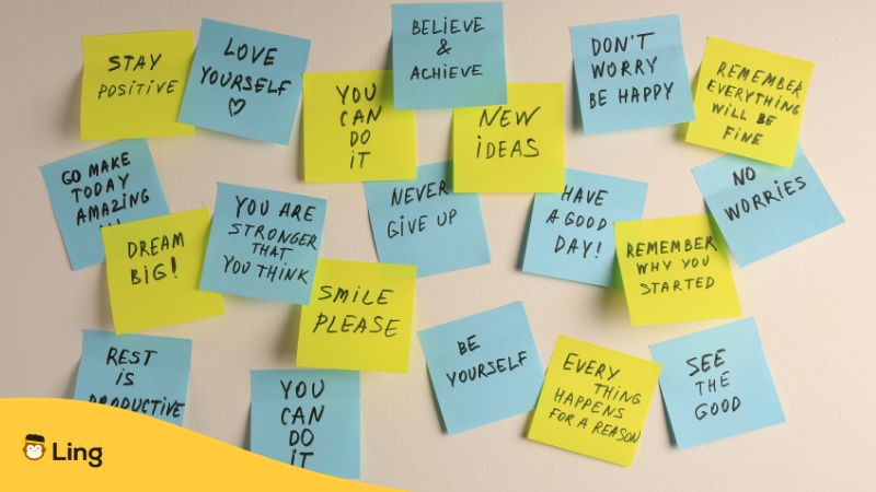blue and yellow sticky notes with words of affirmations written
