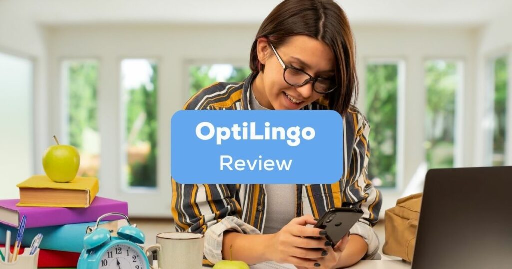 A photo of a female using her phone inside her house behind the OptiLingo Review texts.