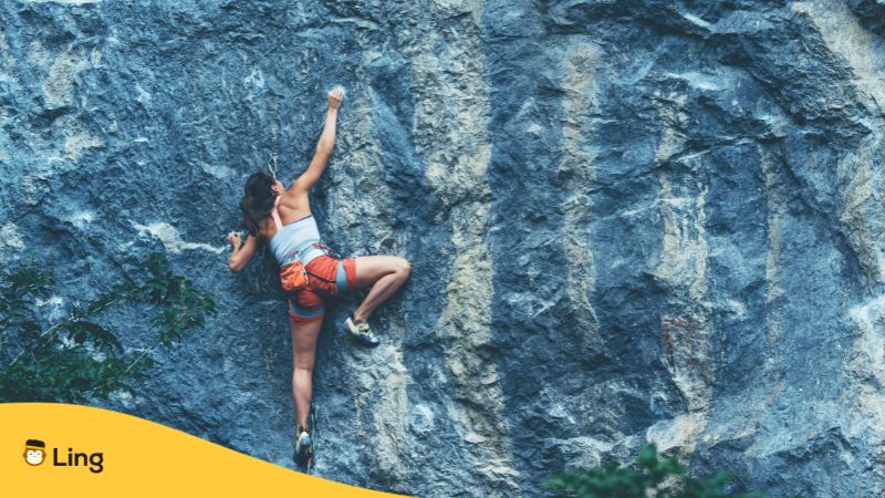 Tagalog-Words-For-Adventure-Sports-ling-app-Person-climbs-a-rock