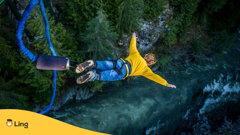 Tagalog-Words-For-Adventure-Sports-ling-app-young-man-bungee-jumping-over-river