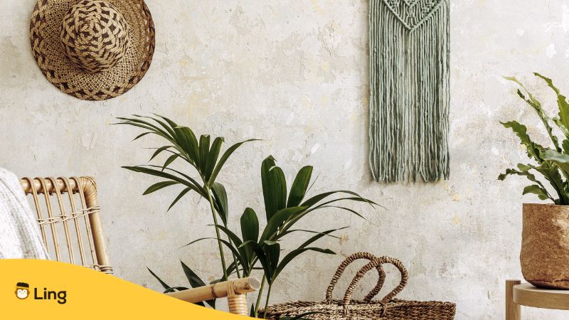 Tagalog-Words-For-Home-Decor-ling-app-Floral-composition-of-living-room-interior-with-rattan-armchair-a-lot-of-tropical-plants-in-design-pots-decoration-and-elegant-personal-accessories-in-cozy