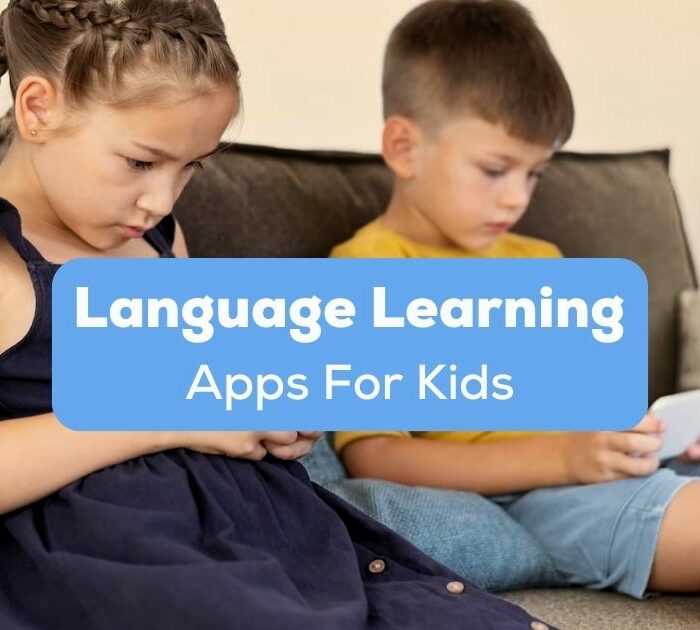 A photo of two kids using their phones while sitting on a sofa behind the Language Learning Apps For Kids texts.