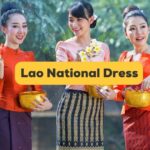 lao national dress banner with three laoatian women wearing traditional outfits in the background