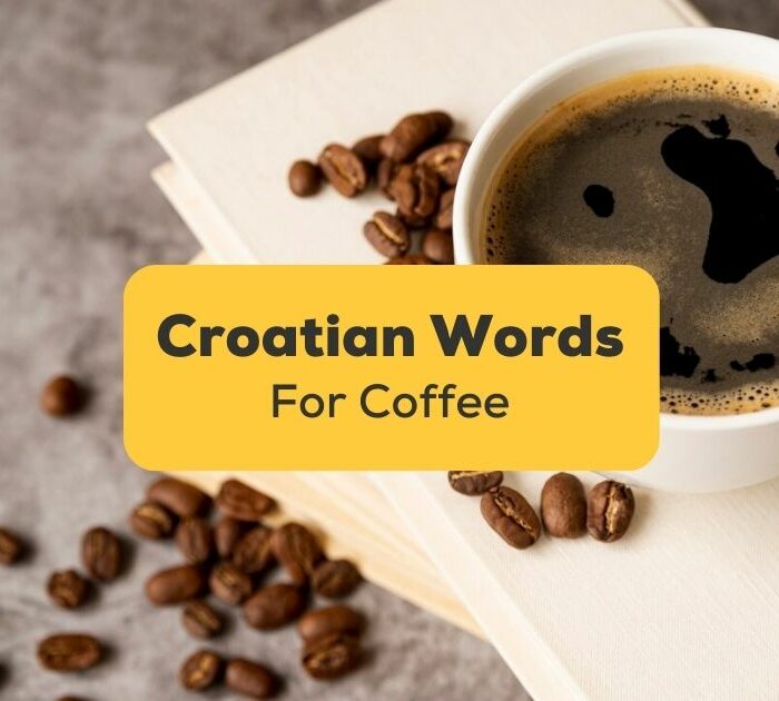 A photo of a cup of coffee with coffee beans behind the Croatian Words For Coffee texts.