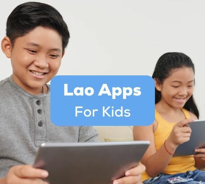 A photo of two happy young language learners using their tablets while sitting on a couch behind the Lao Apps For Kids texts.