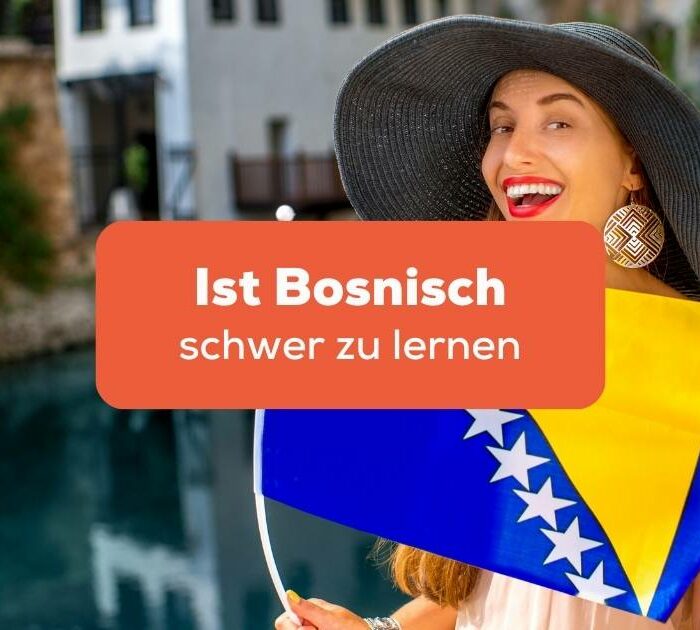 Junge Frau mit Hut hält lachend die bosnische Flagge in der Hand und freut sich, dass sich erfolgreich bosnisch mit der Ling-App gelernt hat, nachdem sie sich gefragt hat, ist bosnisch schwer zu lernen?