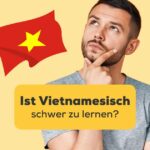Brünetter Mann wundert sich: Ist Vietnamesisch schwer zu lernen und freut sich das er mit der Ling-App Vietnamesisch lernen kann
