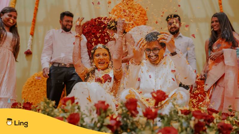 Indische Hochzeit. Lerne herzliche Glückwünsche auf Malayalam auszudrücken mit der Ling-App.