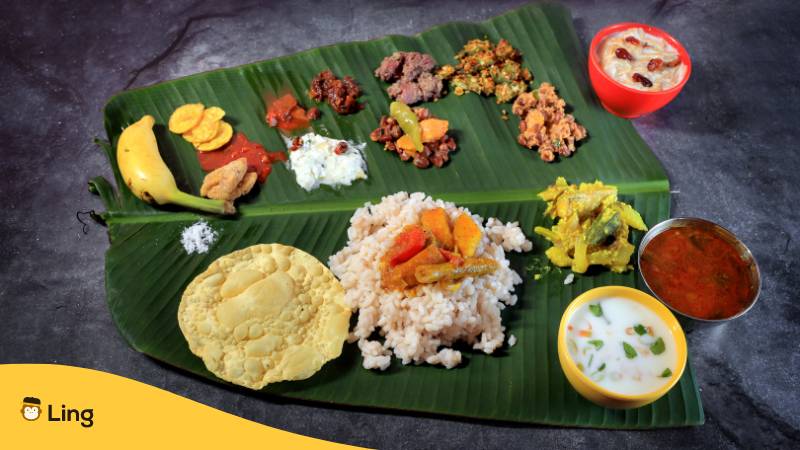 onam sadhya - traditionelles Essen und Kultur in Kerala. Entdecke Traditionen und Rituale in Kerala mit der Ling-App.