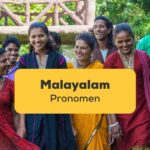Gruppe aus traditionell gekleideten Indern. Erfahre alles über Malayalam Pronomen der indischen Sprache mit der Ling-App.