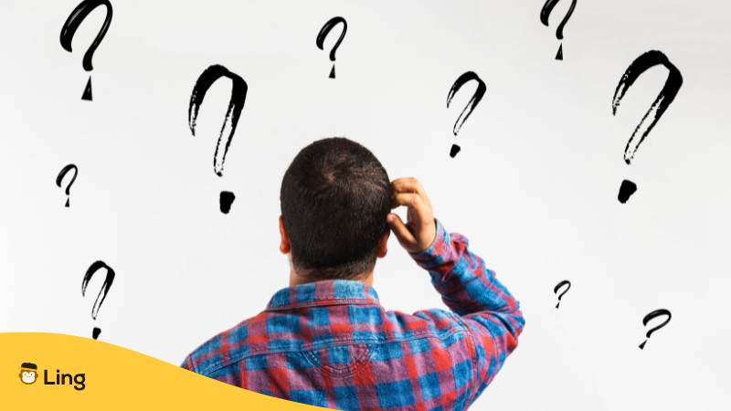 Mann, der sich am Kopf kratzt und fragt sich, warum? Lerne 30+ einfache georgische Fragewörter mit der Ling-App.
