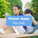 Khmer apps for kids - A photo of two kids with phones sitting on a bench