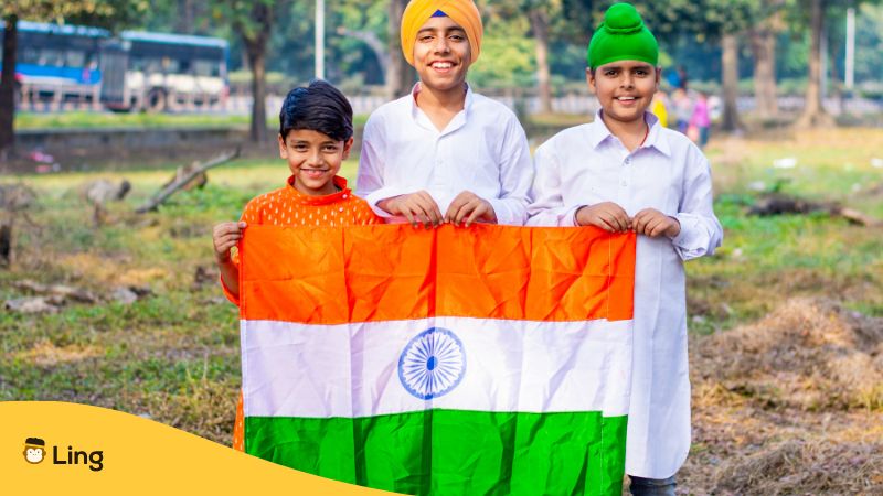 Boys holding the flag of India