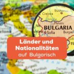 Lupe über einer Länderkarte, wobei Bulgarien durch die Linse vergrößert wird. Lerne 90 Länder und Nationalitäten auf Bulgarisch mit der Ling-App
