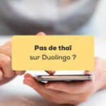 Pas de thaï sur duolingo Mains tenant un smartphone