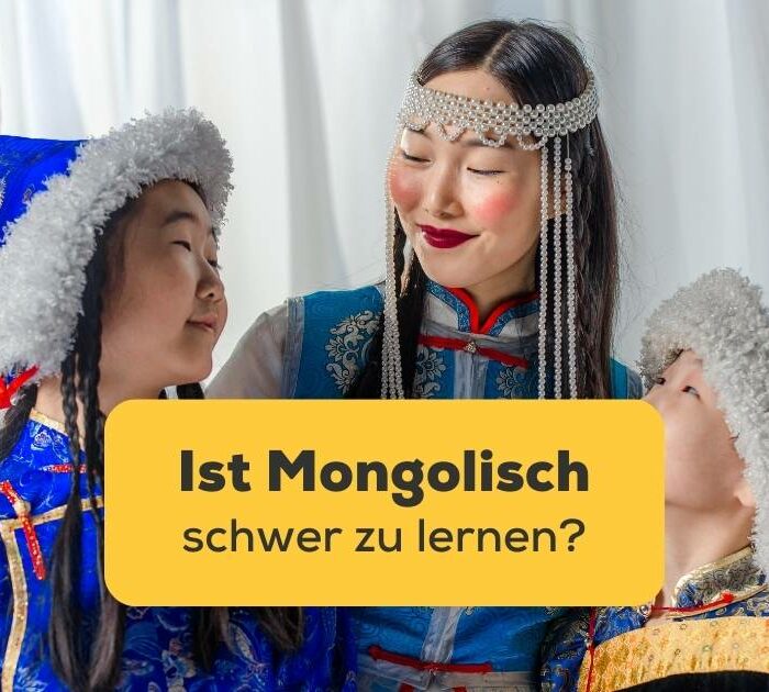 Eine mongolische Mutter, die zwischen ihren Kindern steht. Ist Mongolisch schwer zu lernen? Erfahre 3 verrückte Wahrheiten mit der Ling-App.