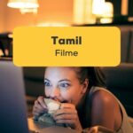 Junge Frau schaut Tamil Filme, um Sprache zu lernen. Entdecke über 6 der besten Tamil Filme
