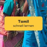 Tamilische Anhängerin bei einer religiösen Prozession. Lerne wie du Tamil schnell lernen kannst mit der Ling-App.