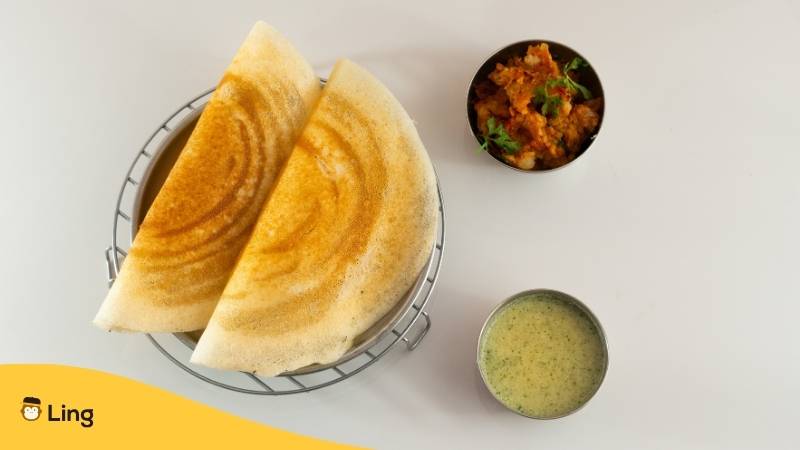 Leckere indische Dosa zum Frühstück. Lerne diese 7 einfachen Wege, um einen guten Morgen auf Tamil wünschen zu können! Lerne Tamil mit der Ling-App.