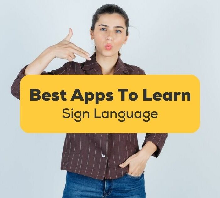 Best apps to learn sign language - A photo of a woman doing a hand sign.