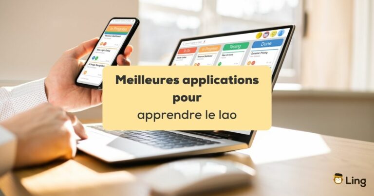 Meilleures Applications Pour Apprendre Le Lao Main Tenant Un Smartphone Devant Un Ordinateur Portable