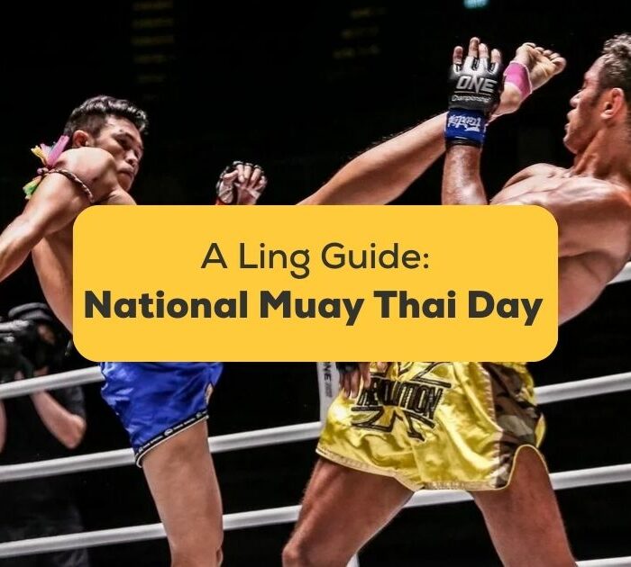 national muay thai day in thailand a photo of two Muay Thai fighters competing