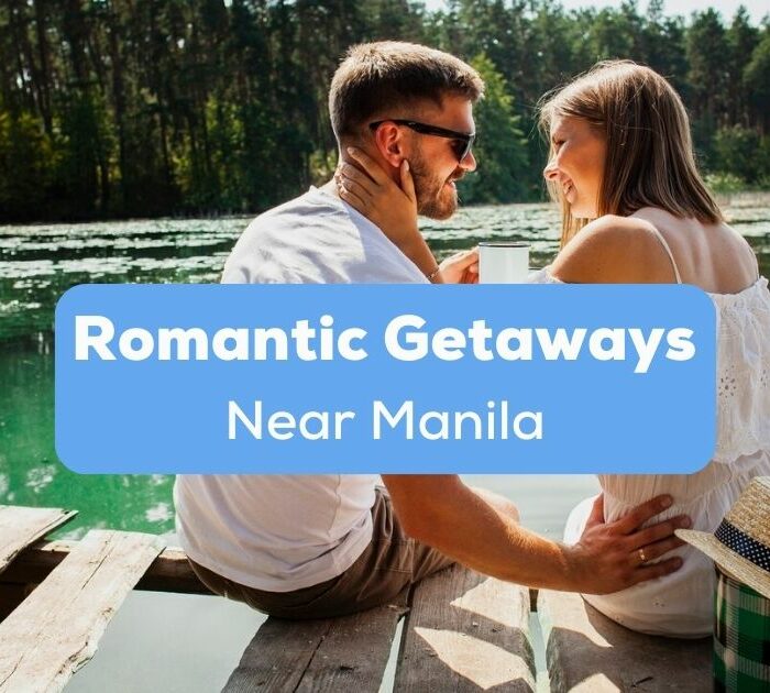 romantic getaways near Manila - A photo of a couple sitting by the lake.