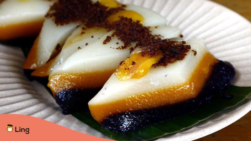 A photo of a rice dessert in the Philippines called sapin-sapin.