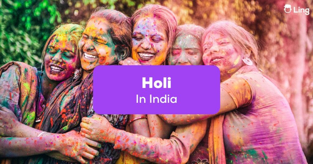 A group of Indian women playing Holi