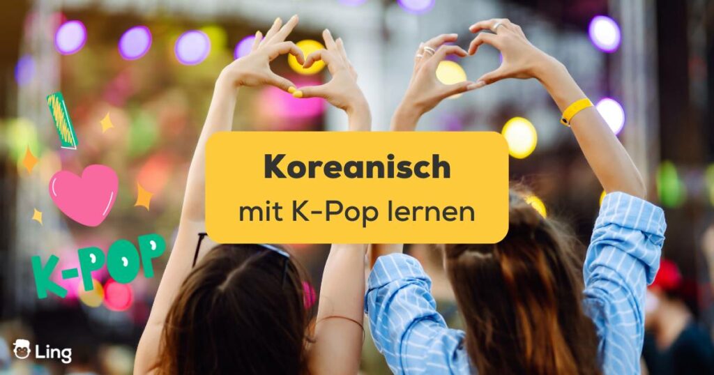 Zwei K-Pop-Fans formen ihre Hände während des Konzerts zu einem Herzen. Erfahre, wie du Koreanisch mit K-Pop lernen kannst