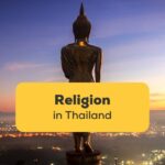 Stehende goldene Buddhastatue bei Sonnenaufgang. Lerne über 10 einfache Wörter zu Religion in Thailand!