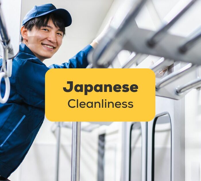 Japanese cleanliness - Man cleaning the inside of a train.