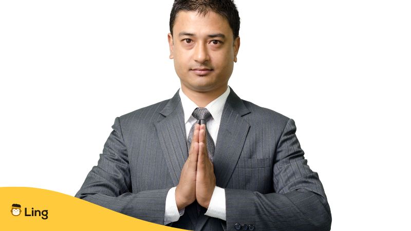 Man with hands in Namaste 