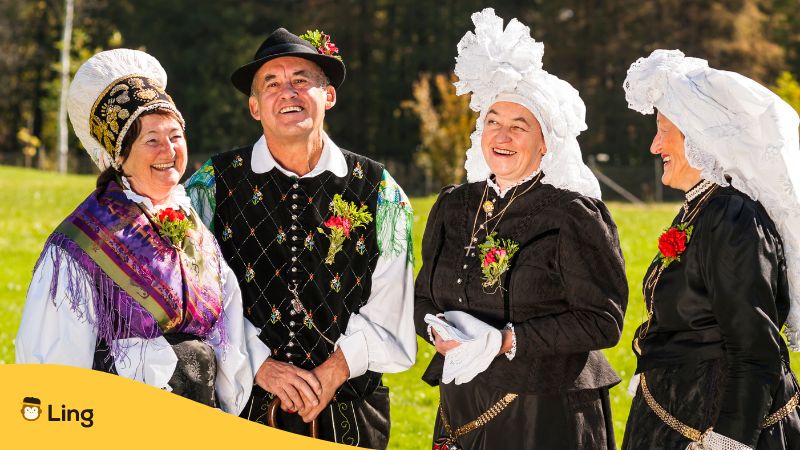 a photo of slovenian people wearing traditional slovenian clothes 