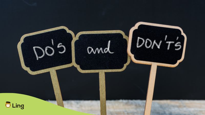 Tagalog words for encouragement - A photo of do's and don'ts written using a chalk.