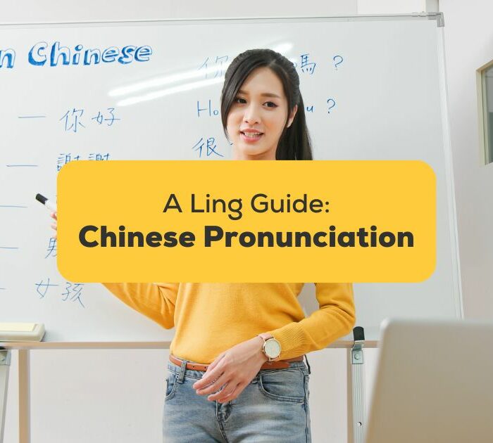 Young woman in front of a whiteboard teaching Chinese pronunciation - Ling app