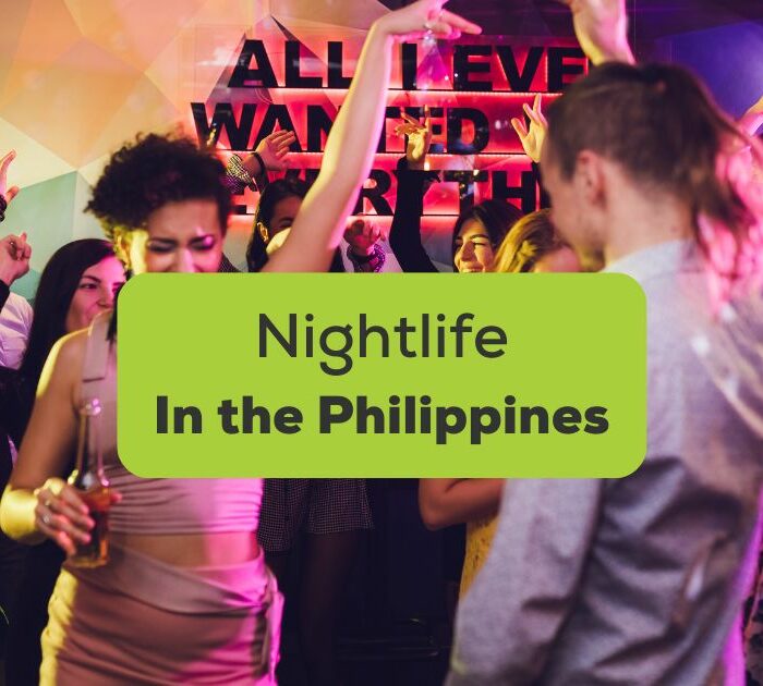 Nightlife in the PHilippines - Young people dancing at a colorful Philippines nightclub.