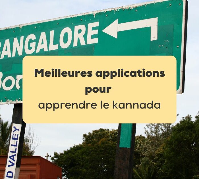 applications pour apprendre le kannada Panneau indiquant la direction de Bangalore écrit en lettres latines et en alphabet kannada