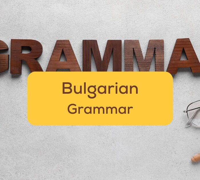 bulgarian_grammar_Ling_app_word_grammar_with_eyeglasses_and_pencil_on_light_background