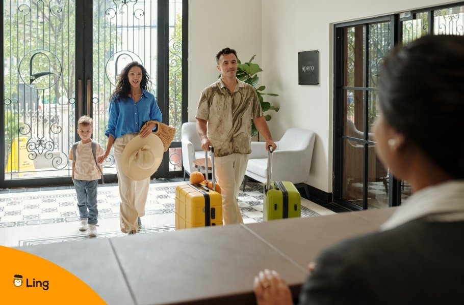 Family (Man, Woman, And Child) Arriving At A Hotel