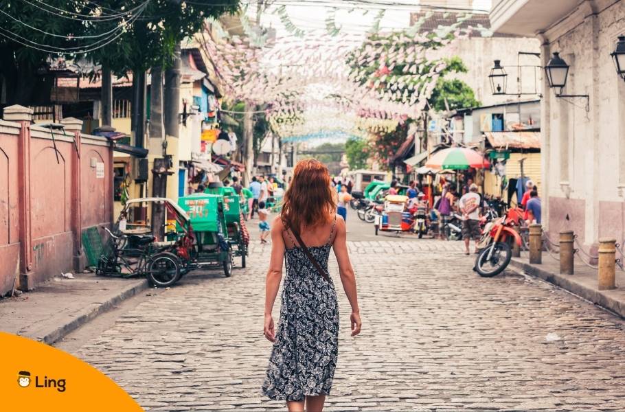 Female Tourist Walking In Manila