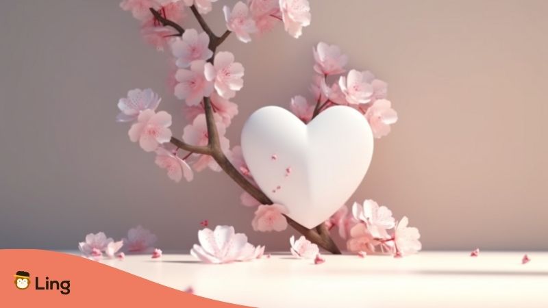 Corazón Blanco Junto A Flores De Cerezo